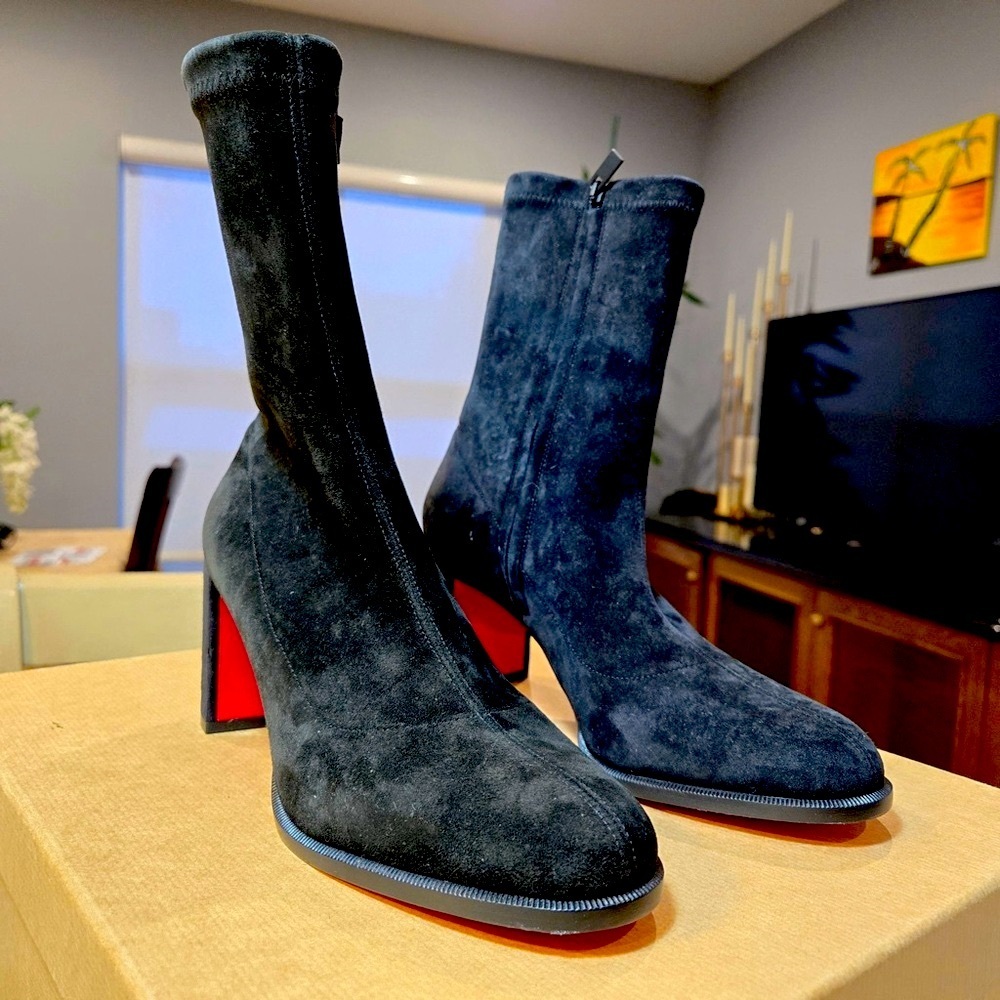 Christian Louboutin Black Heeled Boots with Red Soles